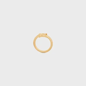 Anillo asimétrico Triomphe en latón con acabado dorado