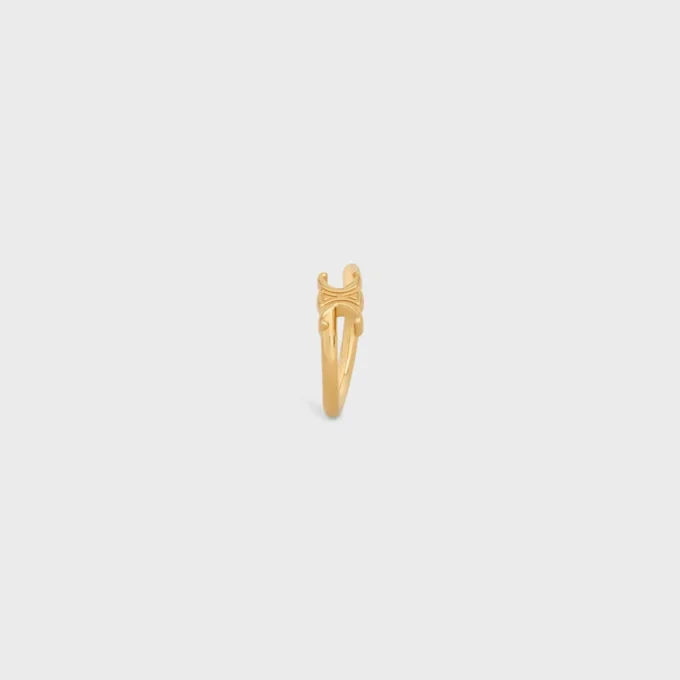 Anillo asimétrico Triomphe en latón con acabado dorado Anillo asimétrico Triomphe en latón con acabado dorado