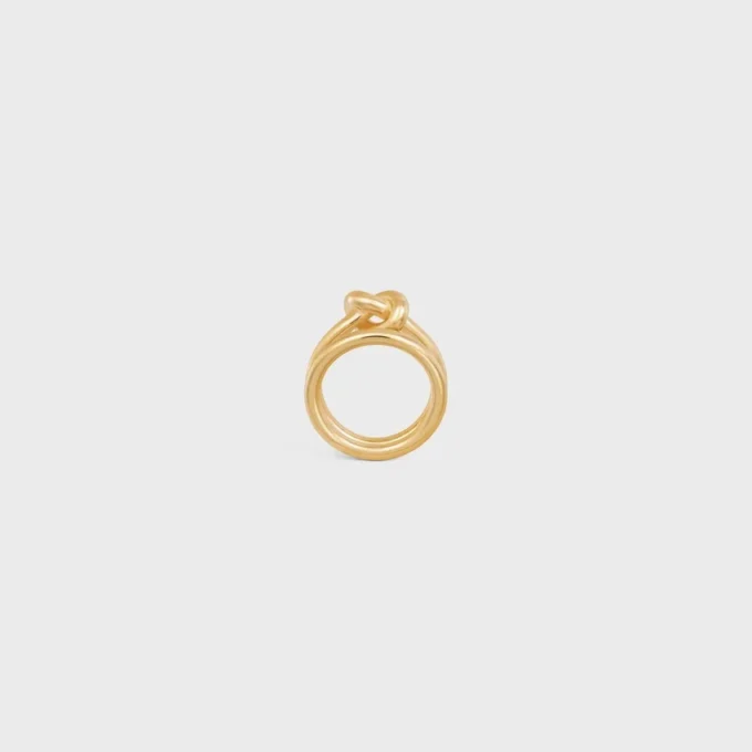 Anillo doble Knot en latón con acabado dorado Anillo doble Knot en latón con acabado dorado