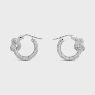 Aros Knot Sparkle en strass y latón con acabado en rodio
