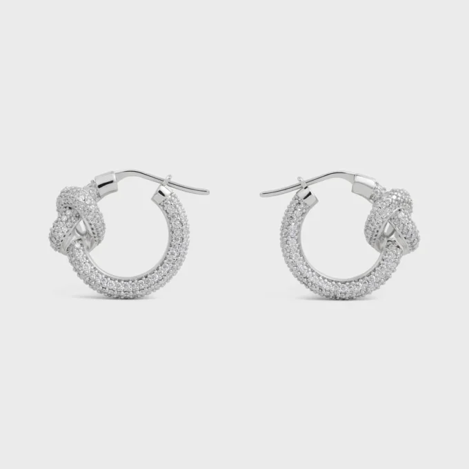 Aros Knot Sparkle en strass y latón con acabado en rodio Aros Knot Sparkle en strass y latón con acabado en rodio