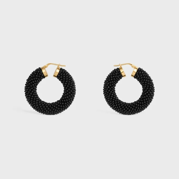 Aros llamativos CELINE Dafila con cuentas de cristal y latón con acabado dorado Aros llamativos CELINE Dafila con cuentas de cristal y latón con acabado dorado