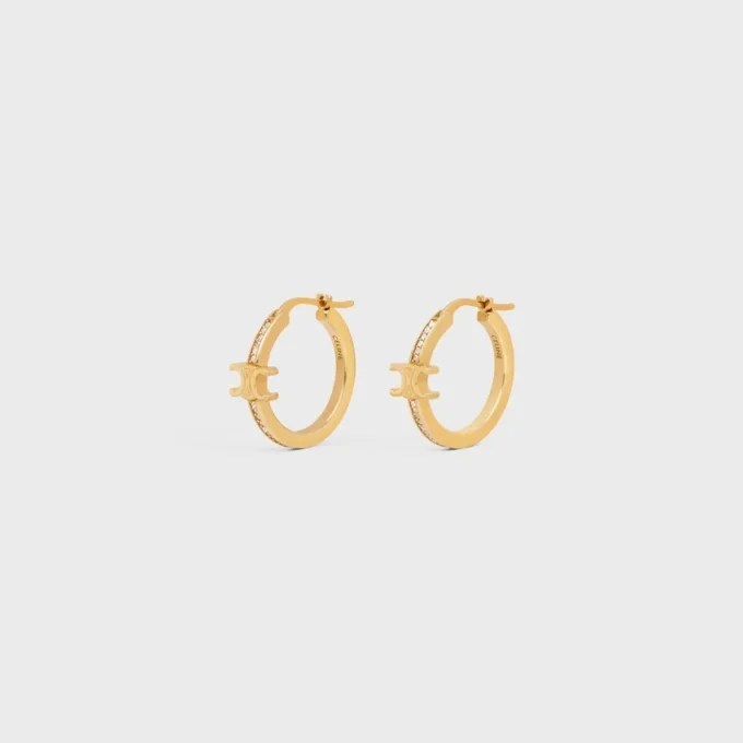Aros Triomphe Sparkle en strass y latón con acabado dorado Aros Triomphe Sparkle en strass y latón con acabado dorado