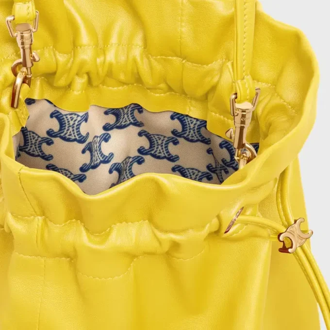 Bolsita de cristal pequeña en piel de cordero Bolsita de cristal pequeña en piel de cordero