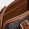 Bolso Boston pequeño en Triomphe Canvas y piel de becerro