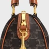 Bolso Boston pequeño en Triomphe Canvas y piel de becerro