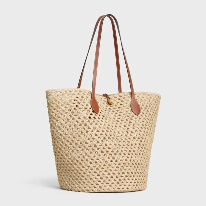 Bolso Bucket Triomphe Beads Basket en rafia y piel de becerro Bolso Bucket Triomphe Beads Basket en rafia y piel de becerro