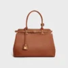 Bolso CELINE Conti en piel de becerro granulada y flexible Bolso CELINE Conti en piel de becerro granulada y flexible