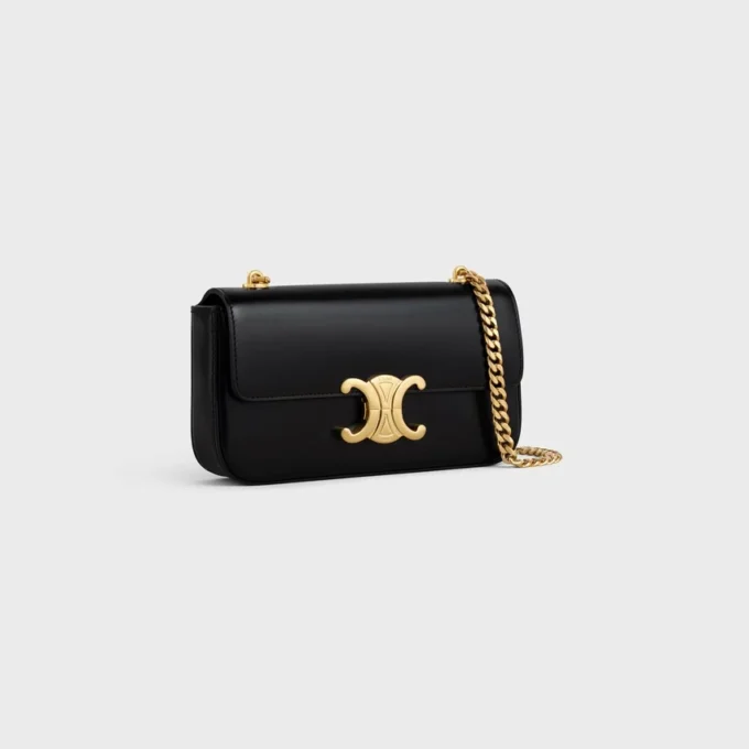 Bolso de hombro con cadena Claude en piel de becerro brillante Bolso de hombro con cadena Claude en piel de becerro brillante