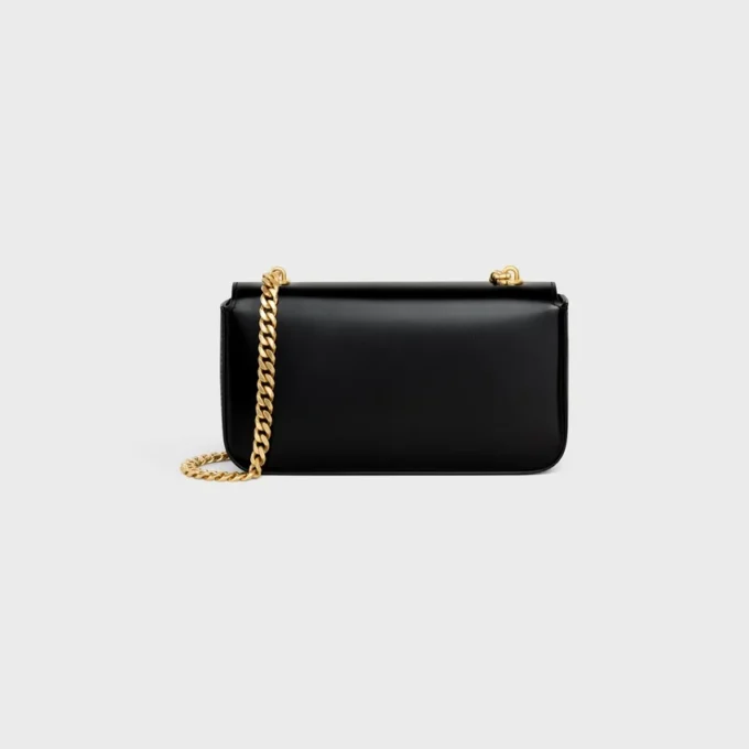 Bolso de hombro con cadena Claude en piel de becerro brillante Bolso de hombro con cadena Claude en piel de becerro brillante