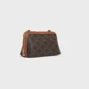 Bolso de mano con cadena en Triomphe Canvas y piel de cordero