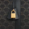 Bolso de viaje en Triomphe Canvas y piel de becerro