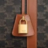 Bolso de viaje grande en Triomphe Canvas y piel de becerro