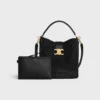 Bolso Louise mediano de rafia y piel de becerro Bolso Louise mediano de rafia y piel de becerro