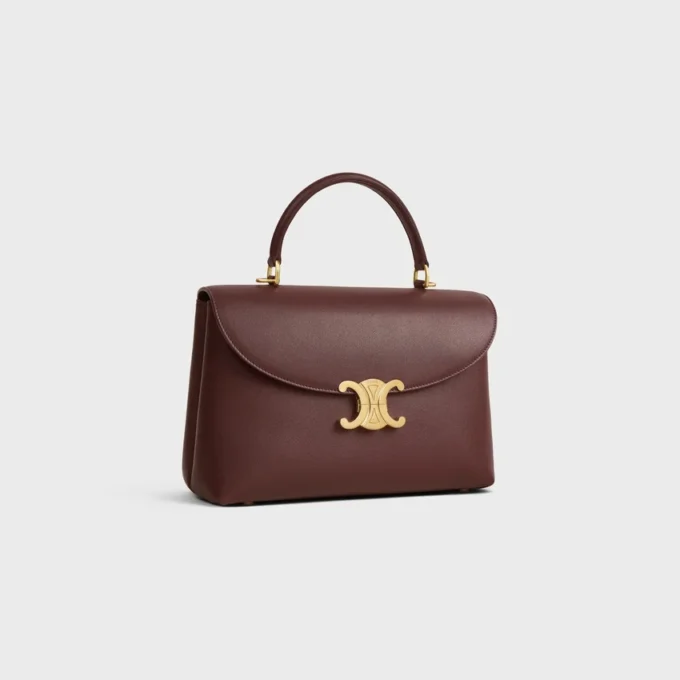 Bolso Nino mediano en piel de becerro granulada y flexible Bolso Nino mediano en piel de becerro granulada y flexible