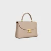 Bolso Nino mediano en piel de becerro granulada y flexible Bolso Nino mediano en piel de becerro granulada y flexible