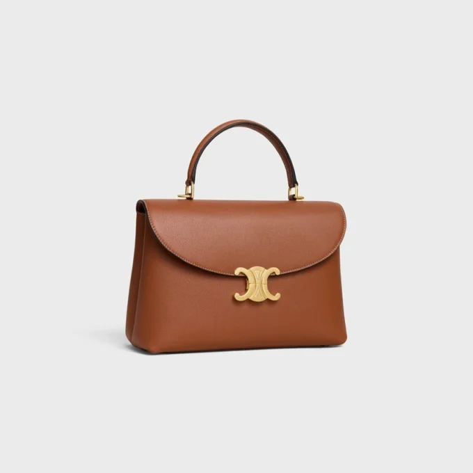 Bolso Nino mediano en piel de becerro granulada y flexible Bolso Nino mediano en piel de becerro granulada y flexible