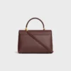 Bolso Nino mediano en piel de becerro granulada y flexible Bolso Nino mediano en piel de becerro granulada y flexible
