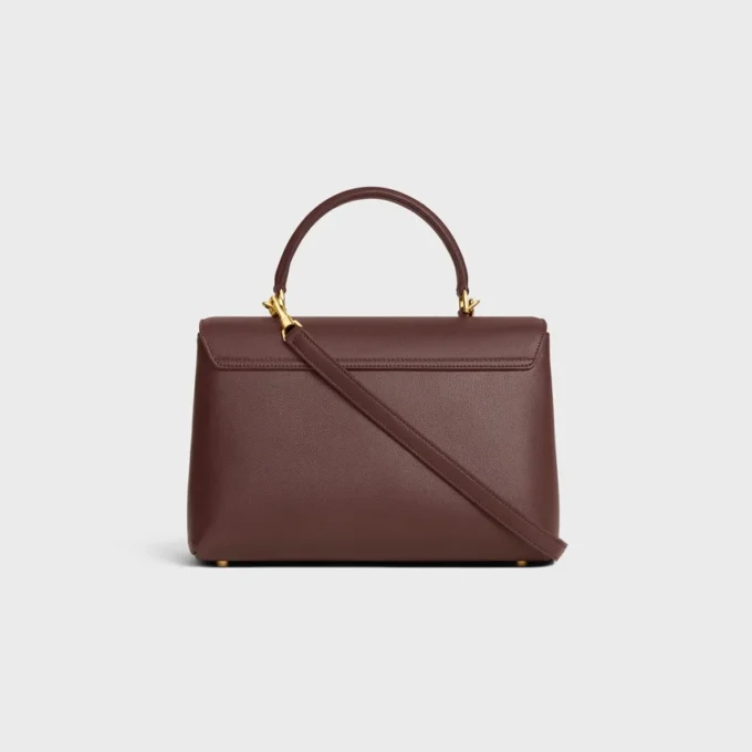 Bolso Nino mediano en piel de becerro granulada y flexible Bolso Nino mediano en piel de becerro granulada y flexible