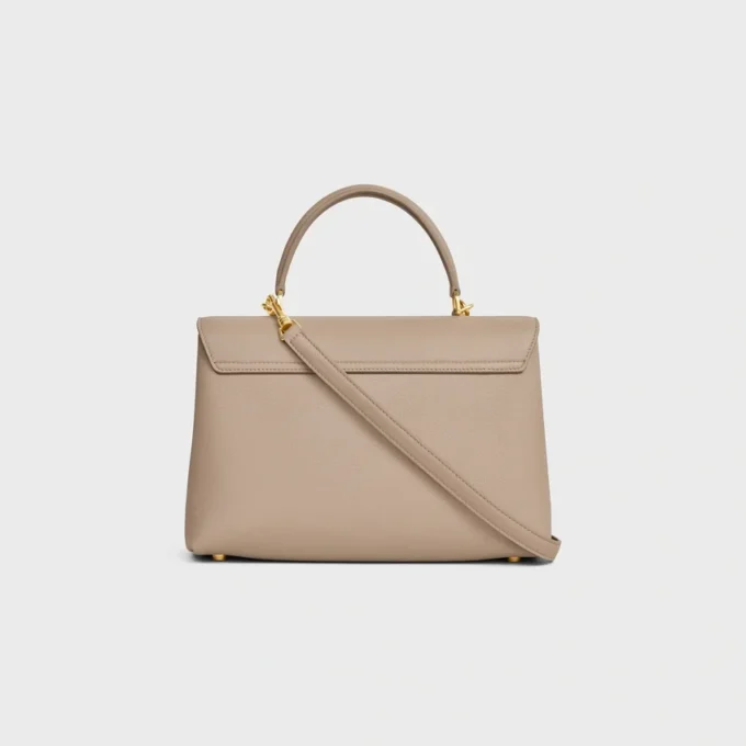 Bolso Nino mediano en piel de becerro granulada y flexible Bolso Nino mediano en piel de becerro granulada y flexible