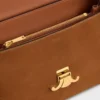Bolso Nino mediano en piel de becerro nobuk Bolso Nino mediano en piel de becerro nobuk