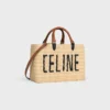 Bolso Panier de CELINE Paris en rafia y piel de becerro Bolso Panier de CELINE Paris en rafia y piel de becerro