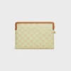 Bolso pequeño con correa de Cuir Triomphe en toile Triomphe y piel de becerro Bolso pequeño con correa de Cuir Triomphe en toile Triomphe y piel de becerro