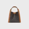 Bolso pequeño tipo cubo en Triomphe Canvas y piel de becerro natural Bolso pequeño tipo cubo en Triomphe Canvas y piel de becerro natural