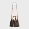 Bolso pequeño tipo cubo en Triomphe Canvas y piel de becerro natural Bolso pequeño tipo cubo en Triomphe Canvas y piel de becerro natural