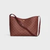 Bolso shopper blando en Triomphe Canvas y piel de becerro