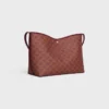 Bolso shopper blando en Triomphe Canvas y piel de becerro