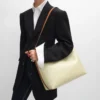 Bolso shopper blando en Triomphe Canvas y piel de becerro