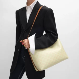 Bolso shopper blando en Triomphe Canvas y piel de becerro