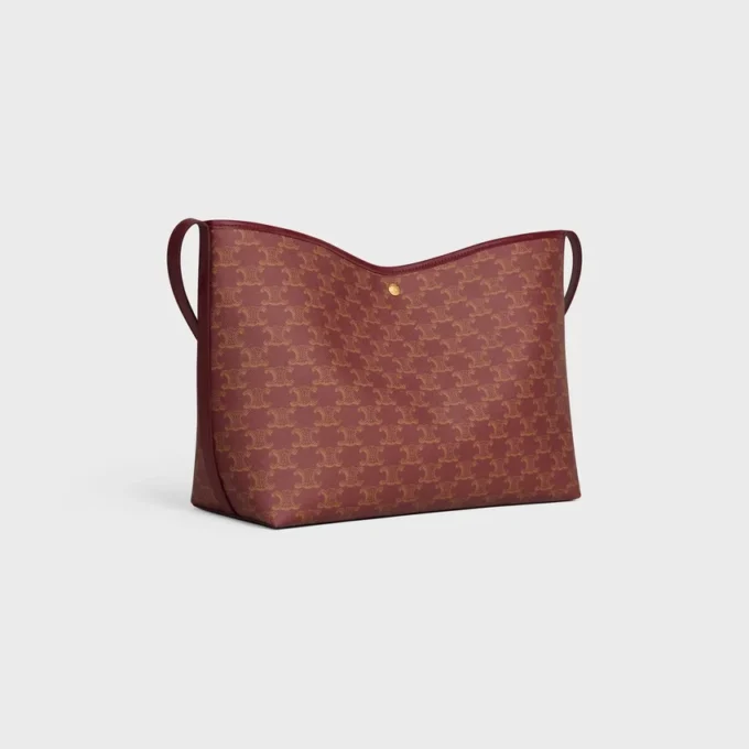 Bolso shopper blando en Triomphe Canvas y piel de becerro