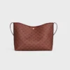 Bolso shopper blando en Triomphe Canvas y piel de becerro