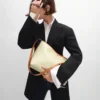 Bolso shopper blando en Triomphe Canvas y piel de becerro