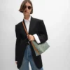 Bolso shopper blando en Triomphe Canvas y piel de becerro