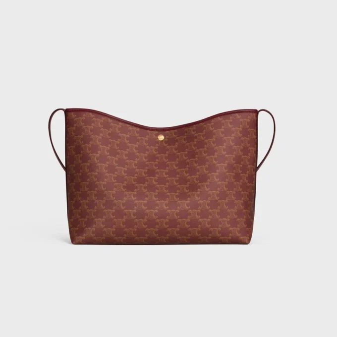 Bolso shopper blando en Triomphe Canvas y piel de becerro