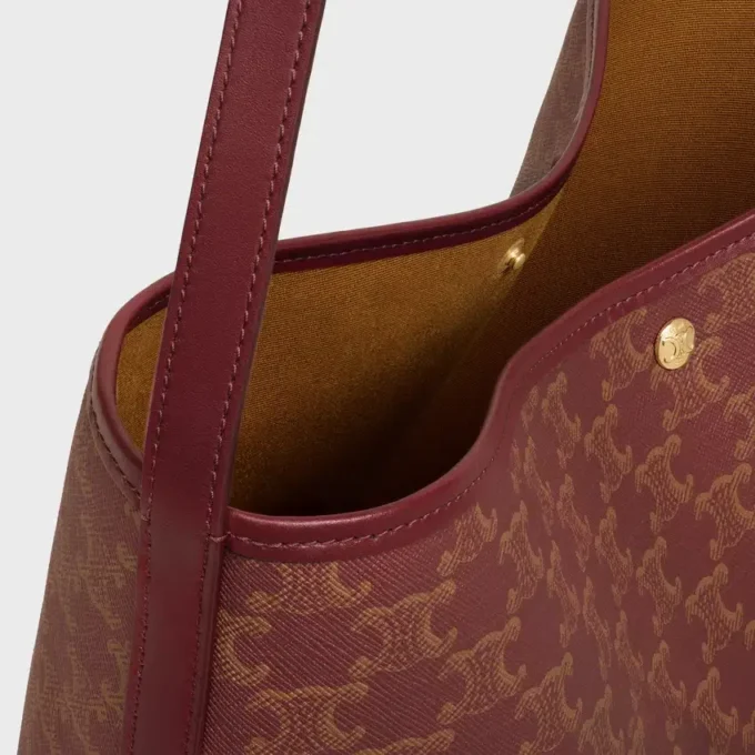 Bolso shopper blando en Triomphe Canvas y piel de becerro