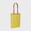 Bolso shopper plano mediano en Triomphe Canvas Bolso shopper plano mediano en Triomphe Canvas