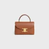 Bolso Teen Nino en piel de becerro granulada y flexible