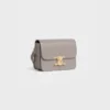 Bolso Teen Triomphe en piel de becerro brillante Bolso Teen Triomphe en piel de becerro brillante