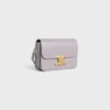 Bolso Teen Triomphe en piel de becerro brillante Bolso Teen Triomphe en piel de becerro brillante