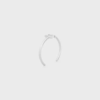 Brazalete asimétrico Triomphe en latón con acabado en rodio