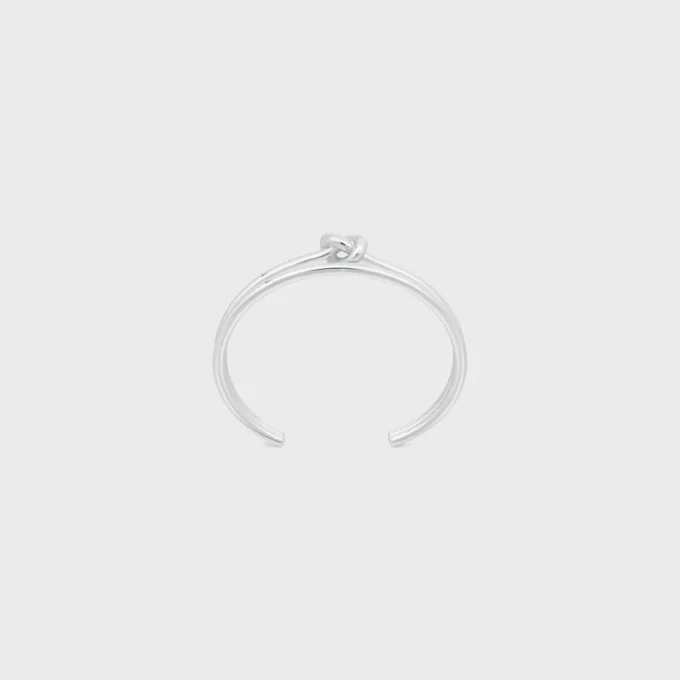 Brazalete doble con nudo en latón con acabado de rodio Brazalete doble con nudo en latón con acabado de rodio