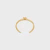 Brazalete doble con nudo en latón con acabado dorado