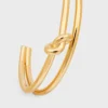 Brazalete doble con nudo en latón con acabado dorado