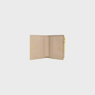 Cartera compacta con estampado Triomphe en piel de becerro granulada y flexible