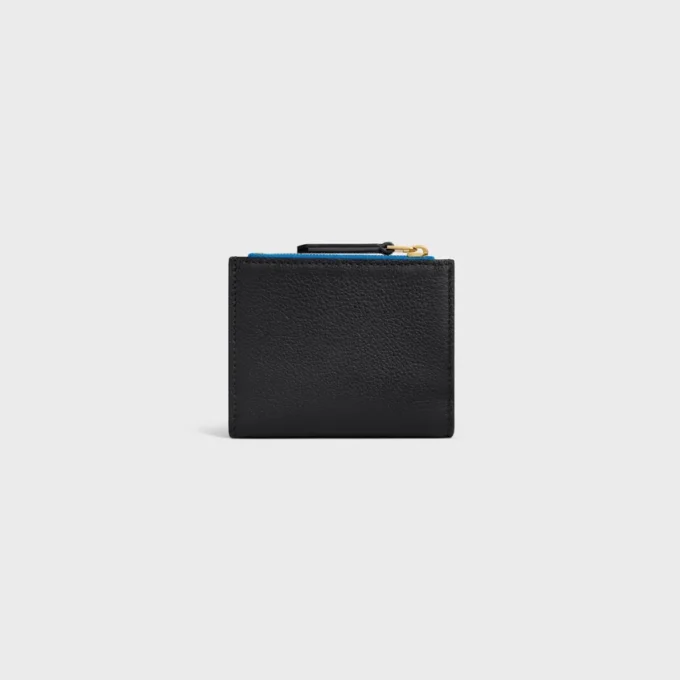 Cartera compacta con estampado Triomphe en piel de becerro granulada y flexible Cartera compacta con estampado Triomphe en piel de becerro granulada y flexible