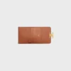Cartera compacta con monedero Triomphe Canvas Cartera compacta con monedero Triomphe Canvas
